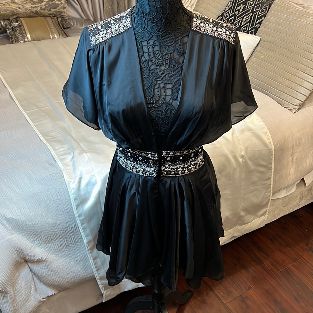 The Clothing Co. Black sequins top.